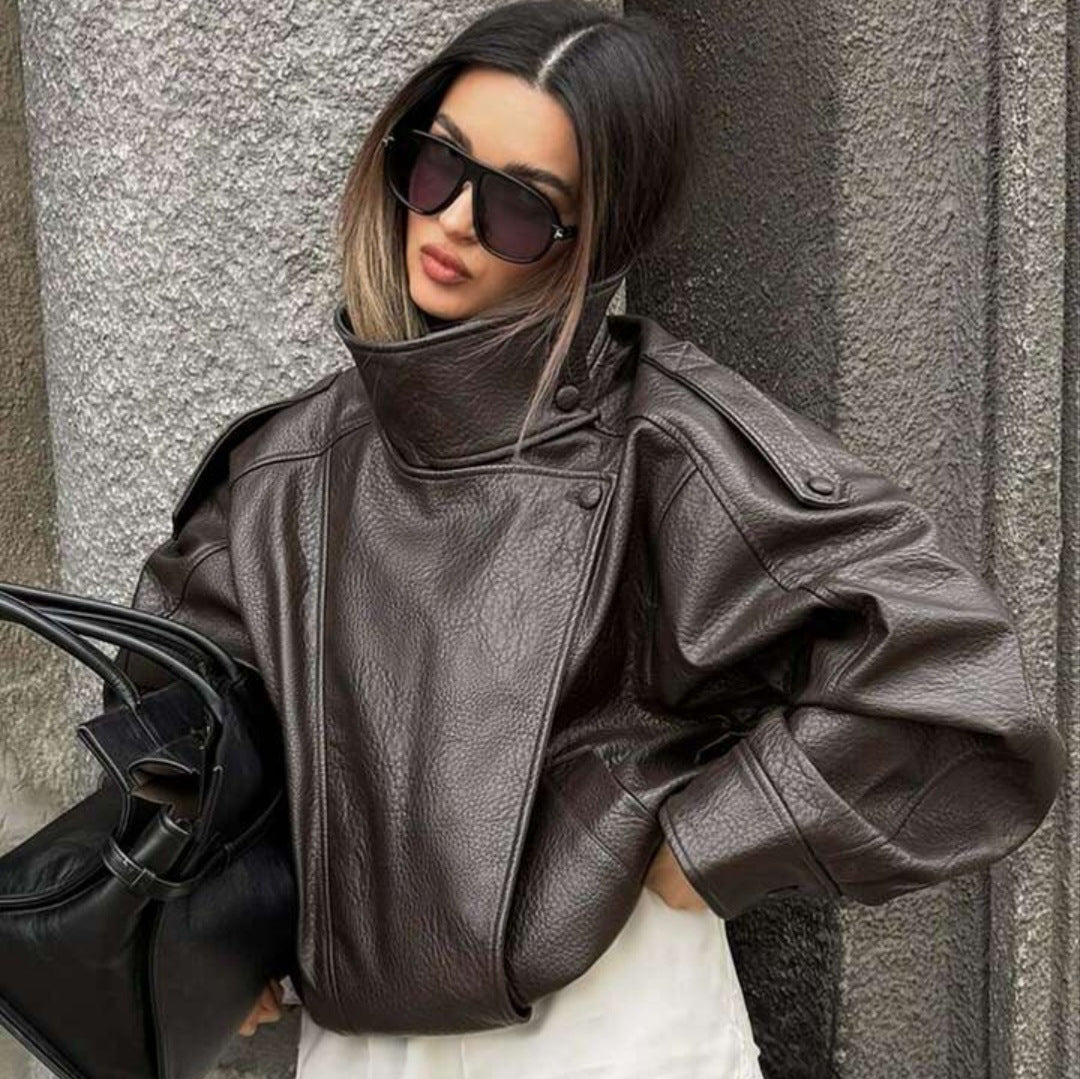 Damen nan oversized Bikerjacke Kunstlederoptik mit hohem Stehkragen, asymmetrischer Druckknopffront, Schulterriegeln und elastischem Saum EB
