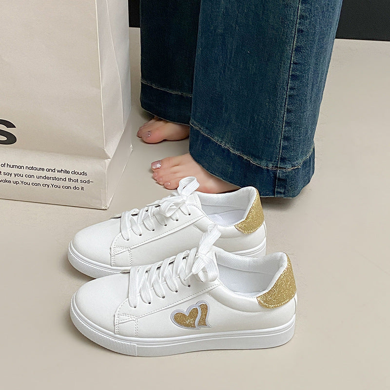 Damen Sneakers mit Glitzerelementen und Herzmotiv EB
