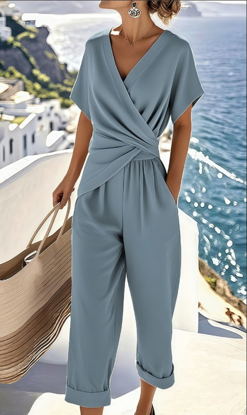 Damen Eleganter Jumpsuit mit Wickeloptik und breiten Beinen EB