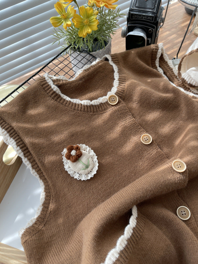 Damen Strickweste mit kontrastierenden Details und Taschen EB
