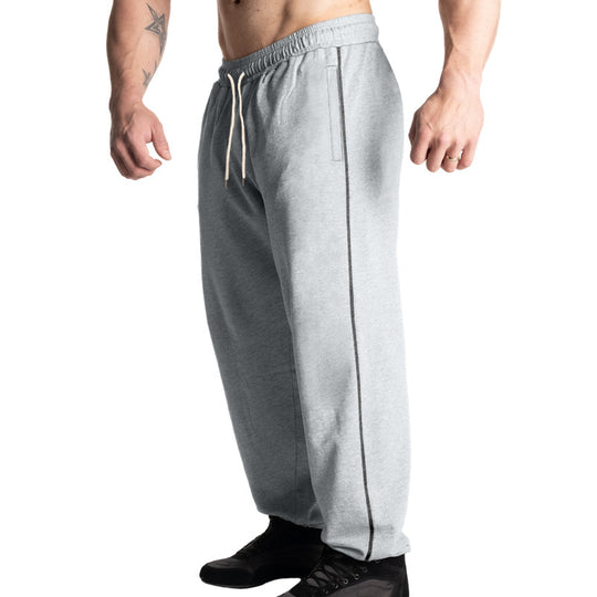 Herren nan weite Freizeit-Jogginghose mit elastischem Tunnelzugbund, dezentem Seitenstreifen und tiefen Eingrifftaschen EB