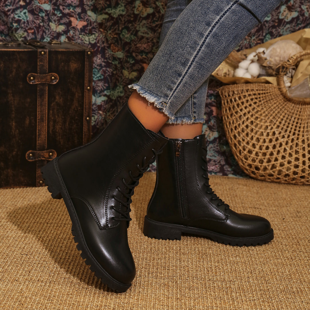 Damen  Schnürstiefel mit seitlichem Reißverschluss und profilierter Gummilaufsohle EB