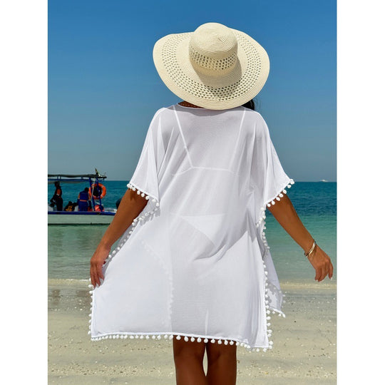 Damen Strandkleid mit dekorativem Pompon-Besatz und elegantem V-Ausschnitt EB