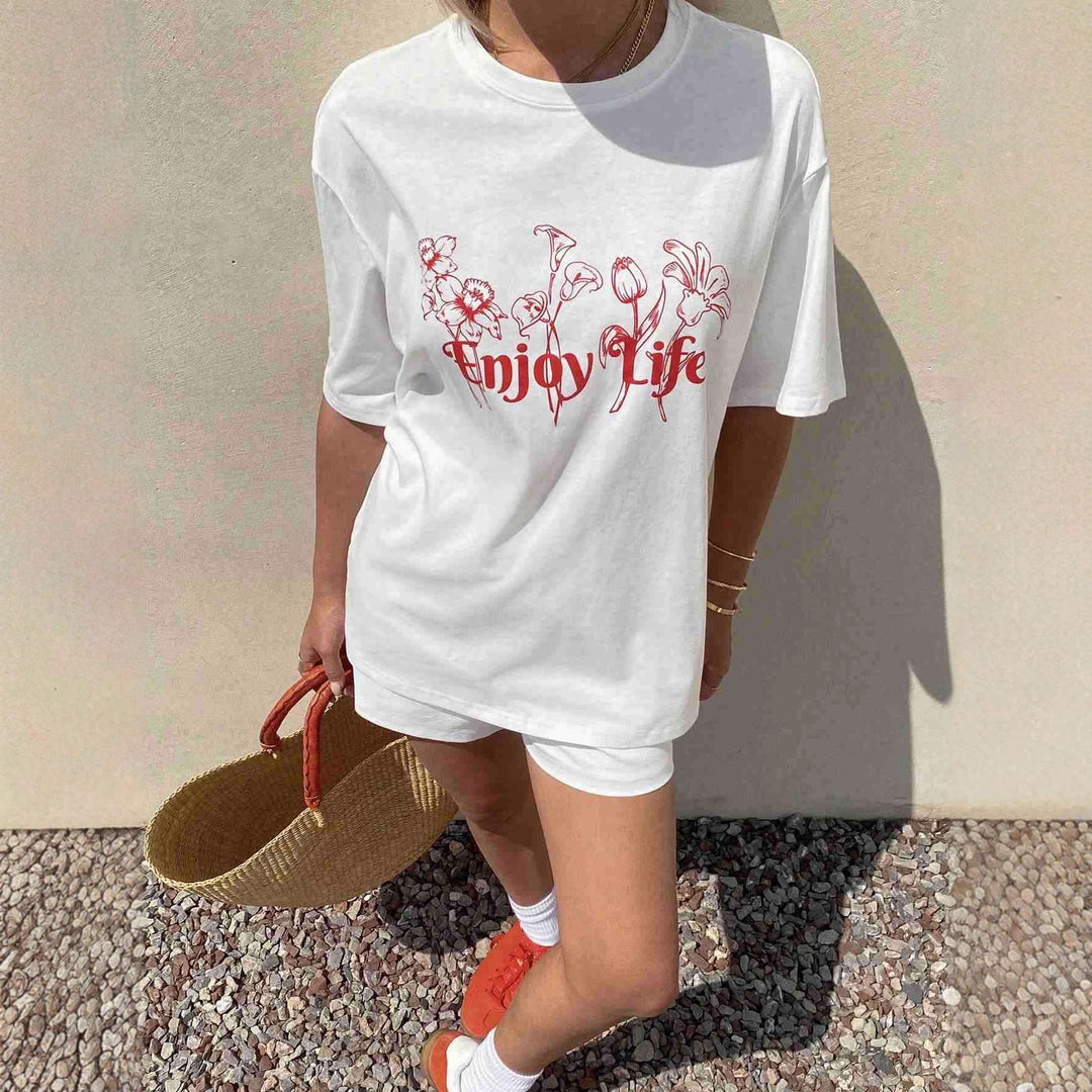 Damen Lässiges Oversize-T-Shirt mit floralem Druck und inspirierendem Schriftzug EB