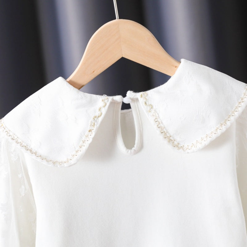 Damen Bluse mit dekorativen Blumenapplikationen und transparenten Puffärmeln EB