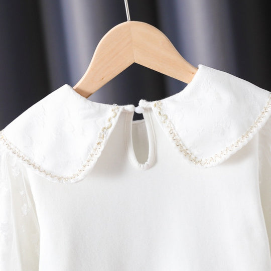 Damen Bluse mit dekorativen Blumenapplikationen und transparenten Puffärmeln EB