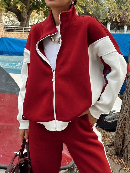 Damen athletisches Zweiteiler-Set aus strukturiertem Sweatstoff mit gekürzter Reißverschlussjacke und hochgeschnittener Jogginghose mit weitem Beinverlauf Eichborn Berlin