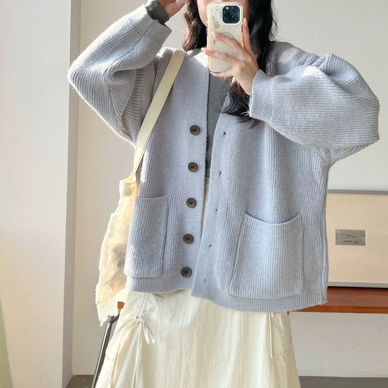 Damen Gemütliche Strickjacke mit großen Taschen und Knopfdetail EB