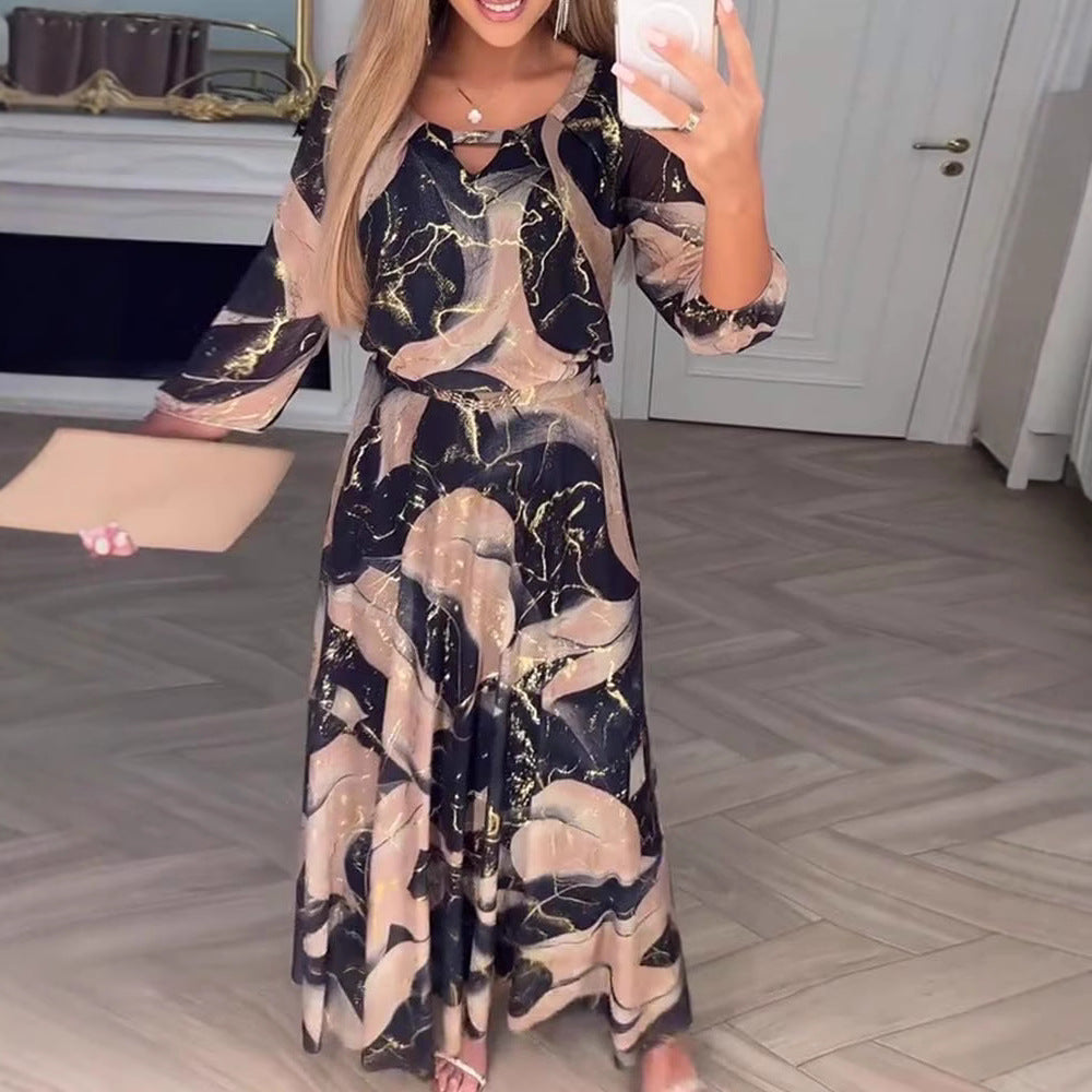 Damen Maxikleid mit elegantem Druckdesign und fließendem Schnitt Heidi-Mode