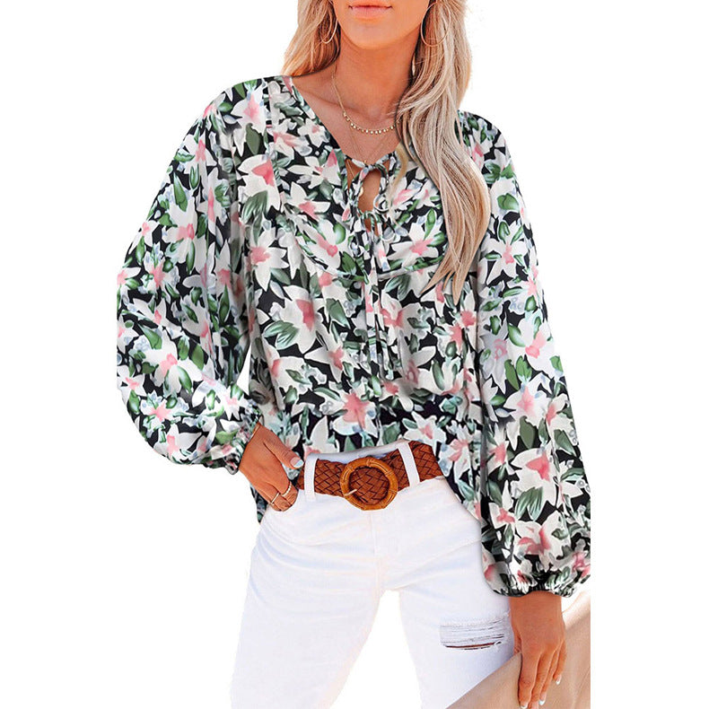 Damen Lockere Bluse mit floralem Muster und voluminösen Ärmeln EB