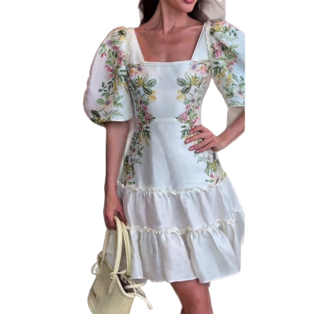 Damen Blumenkleid mit voluminösen Puffärmeln und fließendem Rock EB