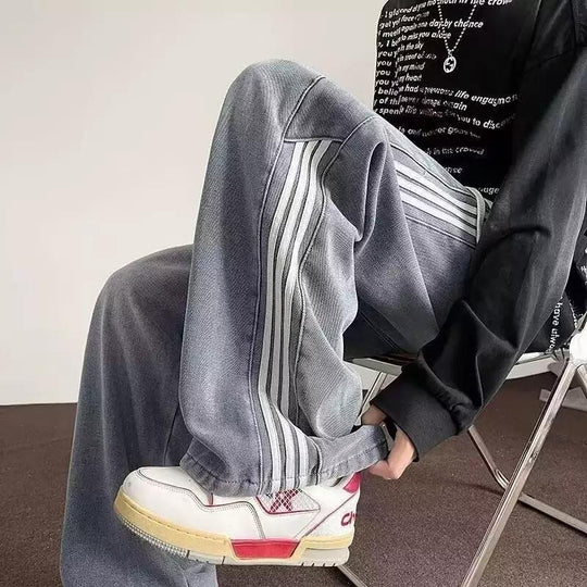 Herren weit geschnittene Denim-Hose mit seitlichen Streifen und Taschen EB
