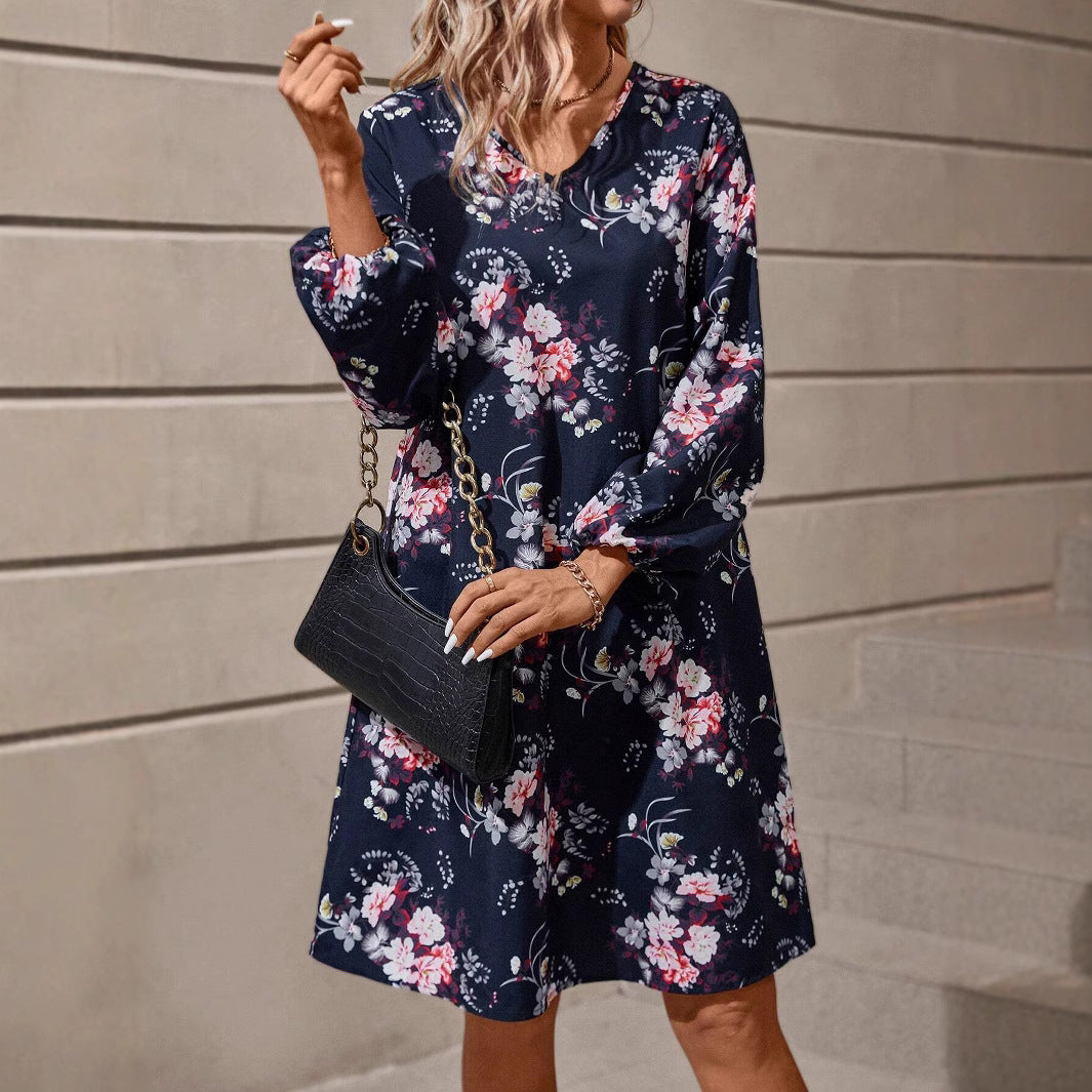 Damen Blusenkleid mit floralem Design und voluminösen Ärmeln EB