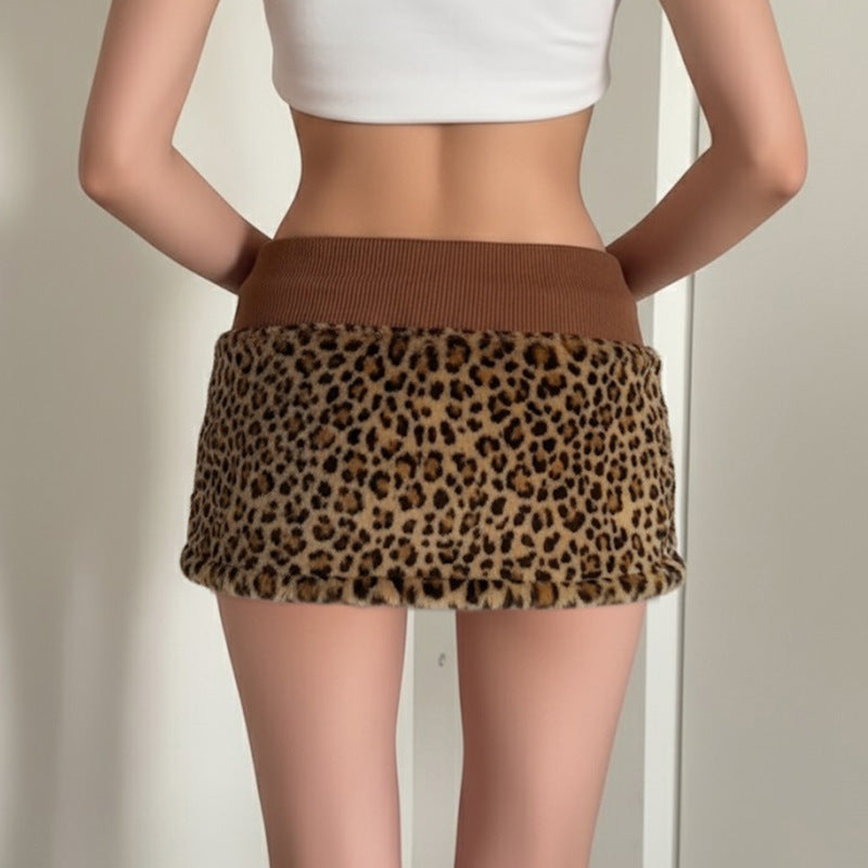 Damen eleganter Minirock aus fellartigem Material mit Modellknopf und Taillenband EB