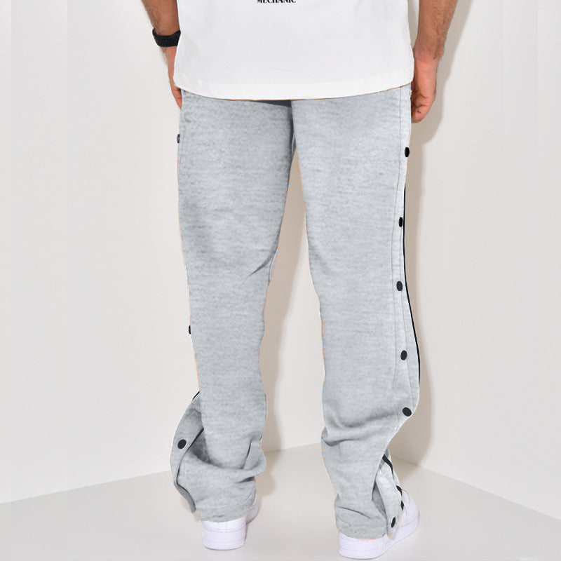 Herren Sportliche Jogginghose mit Druckknopf-Detail und seitlichen Taschen EB