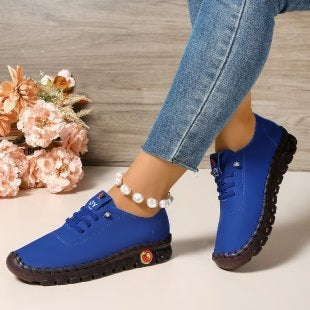 Damen Bequeme Lederoptik-Slipper mit flexibler Profilsohle und Mokassin-Naht EB