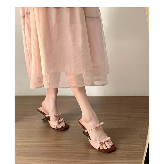 Damen elegante Mules mit dekorativen Schleifen und einzigartigem Absatzdesign EB