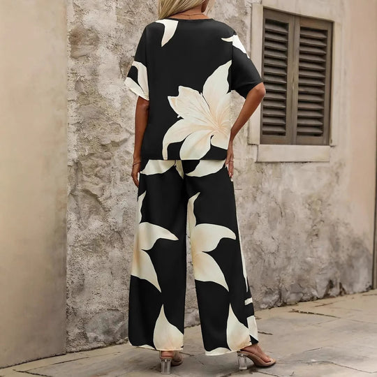 Damen Eleganter Jumpsuit mit floralen Mustern und weitem Bein EB