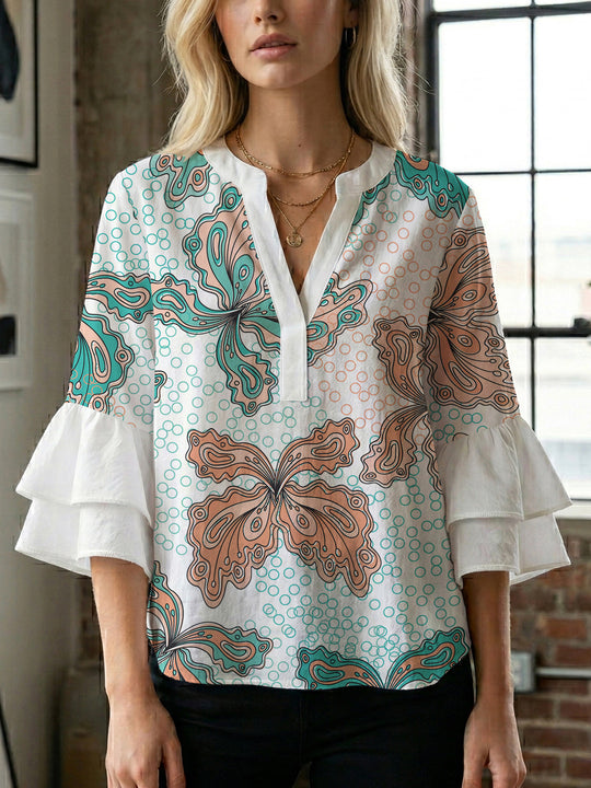 Damen Bluse mit voluminösen Rüschenärmeln und kreativem Floraldesign EB