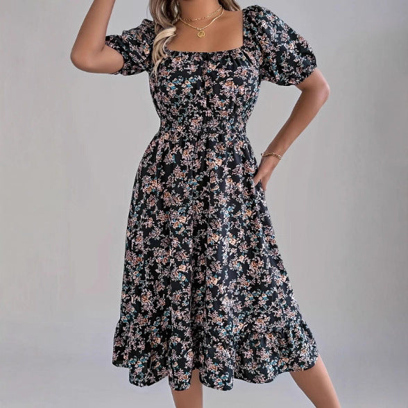 Damen sommerliches Blumenkleid mit Puffärmeln und Rüschensaum EB