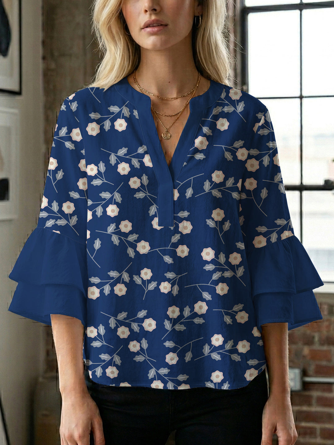 Damen Bluse mit voluminösen Ärmeln und floralem Design EB