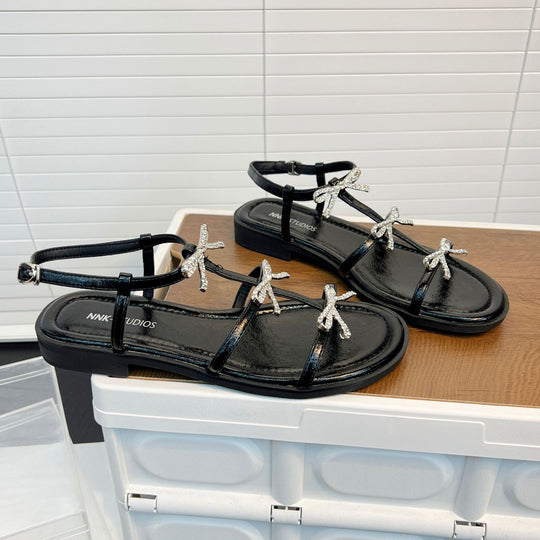 Damen Elegante Sandalen mit glitzernden Schleifen und verstellbarem Riemendesign EB