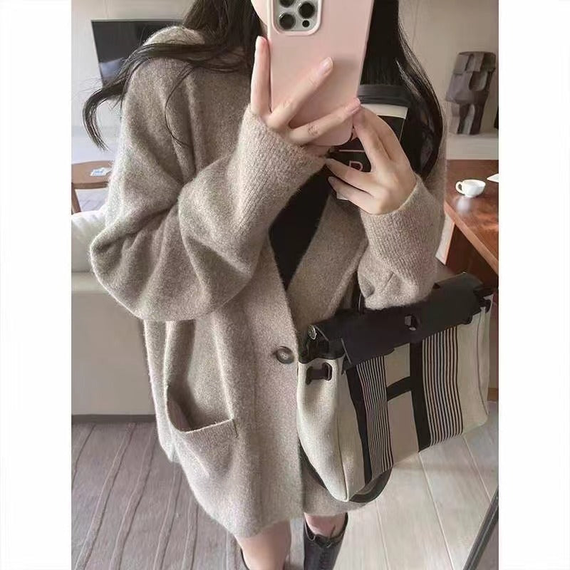 Damen Gemütlicher Strickcardigan mit großen Taschen und asymmetrischem Schnitt EB