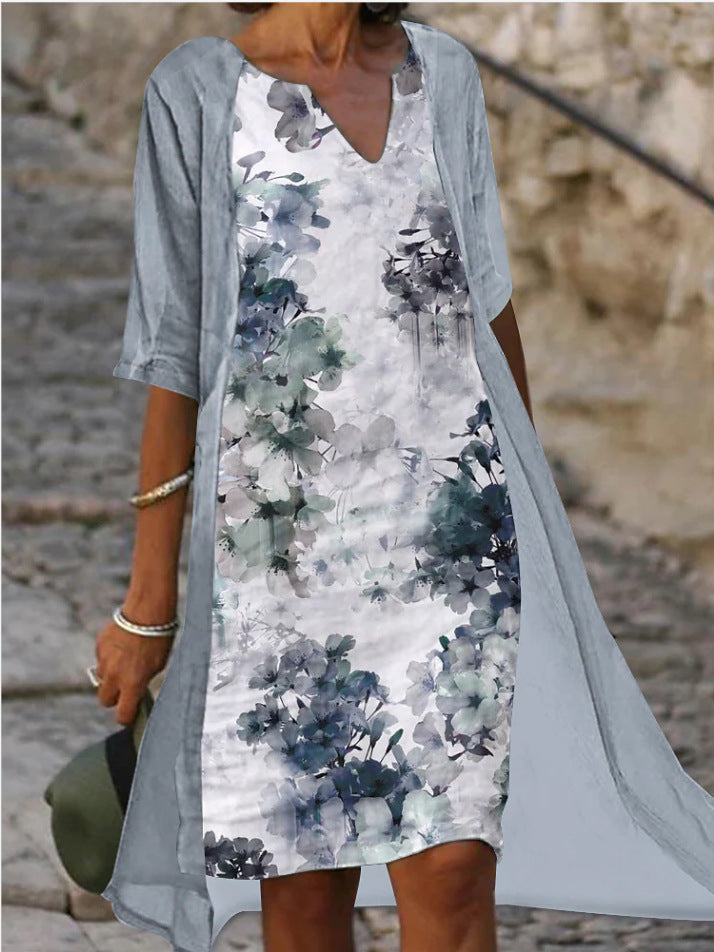 Damen Freizeitkleid mit floralem Design und tiefem V-Ausschnitt EB