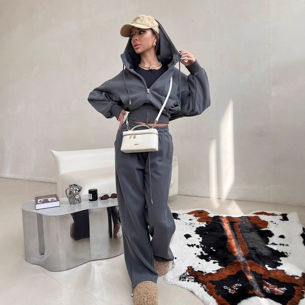 Damen kurzes Kapuzen-Sweatjacke mit Balloonärmeln und elastischer High-Waist Palazzo-Freizeithose Eichborn Berlin