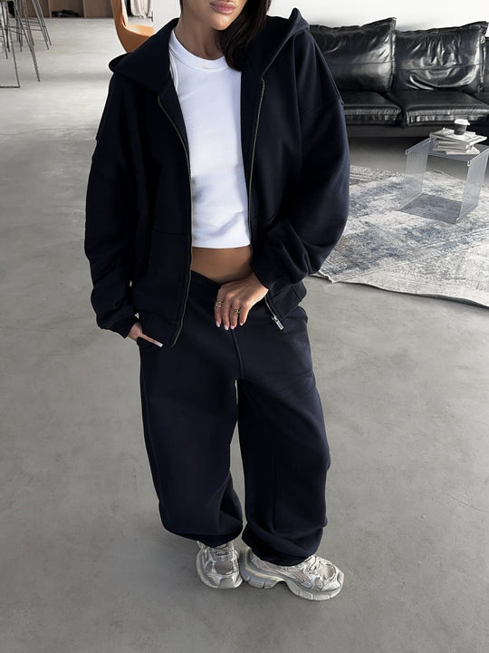 Damen lässiges Zip-Lounge-Set mit übergroßer Kapuzenjacke und taillierter Relax-Jogginghose Eichborn Berlin