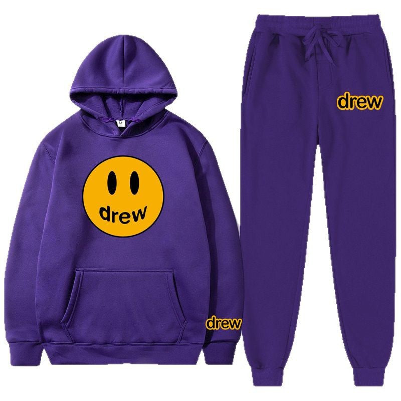 Unisex nan zweiteiliges Lounge-Set aus French-Terry mit Smiley-Print Kapuzenpullover und tapered Jogginghose EB