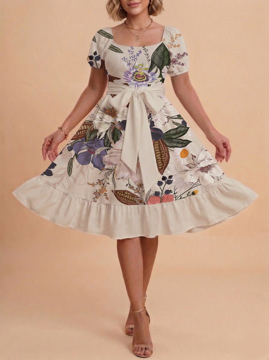 Damen Sommerliches Blumenkleid mit taillierbarem Gürtel und voluminösen Ärmeln EB