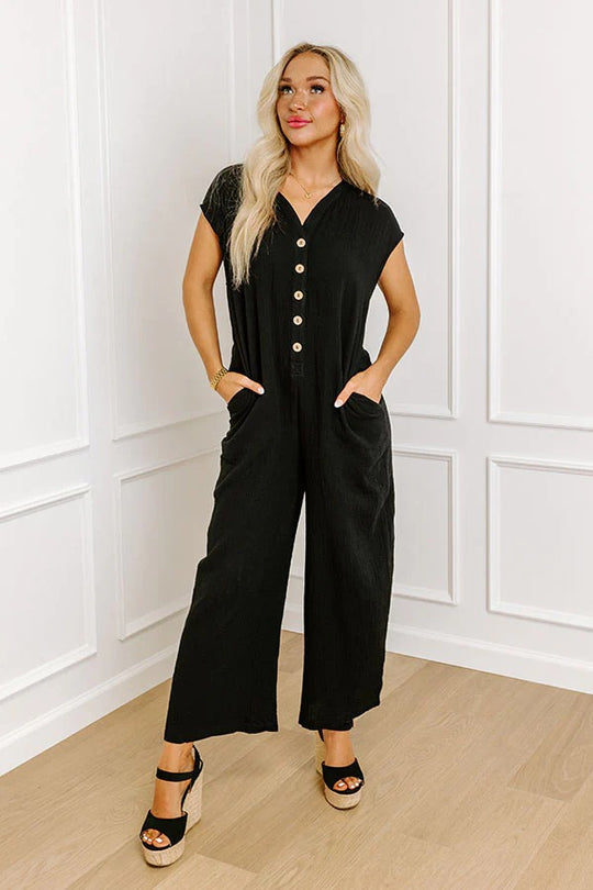 Damen Weitgeschnittener Jumpsuit mit Knopfleiste und Taschen EB