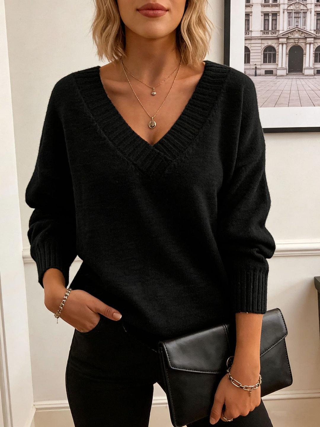 Damen Feinstrickpullover mit tiefem V-Ausschnitt und überschnittener Schulter EB
