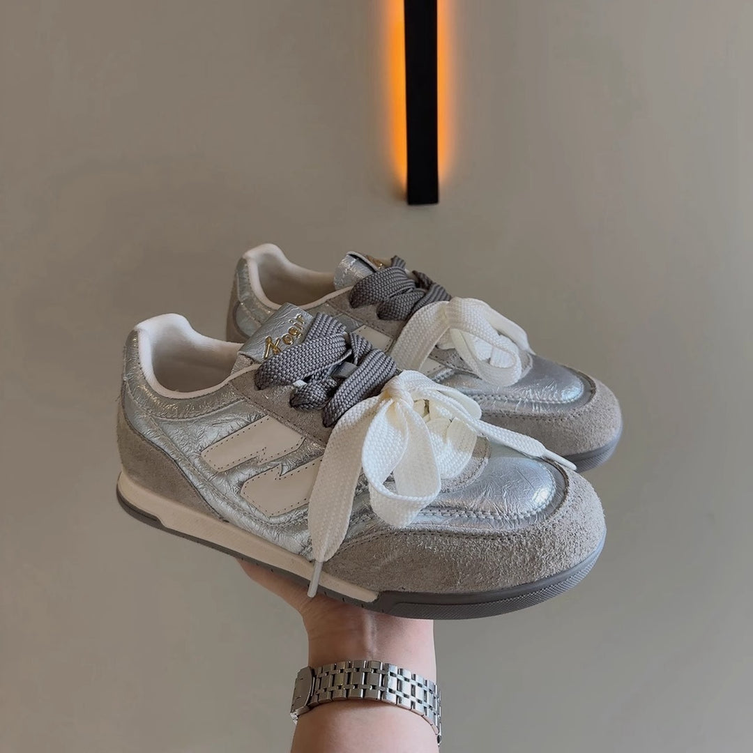 Damen Sneaker mit auffälligem Band und sportlichem Design EB