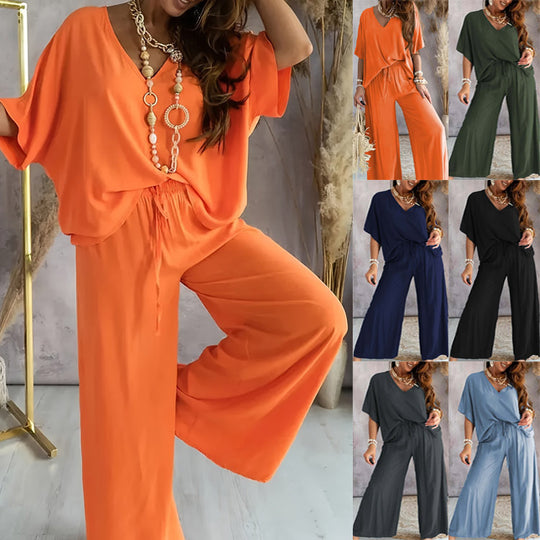 Damen Lässiges Freizeitoutfit bestehend aus lockerem Oberteil und weiten Hosen EB