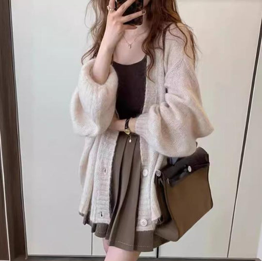 Damen Modische Strickjacke mit weiten Ärmeln und eleganten Details EB