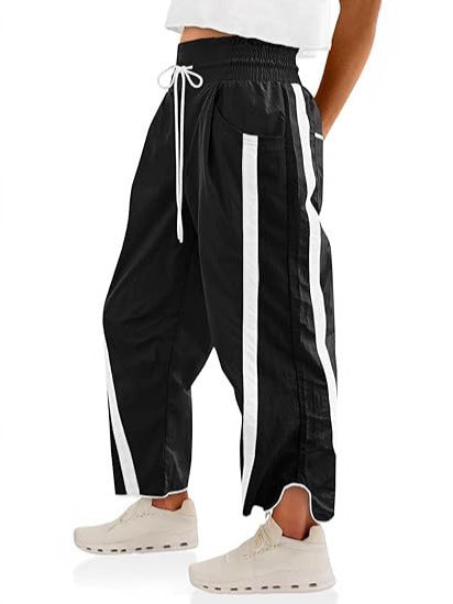 Damen lockere Sporthose mit elastischem Bund und Kontraststreifen EB