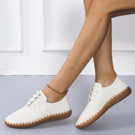 Damen handgenähter Komfort-Sneaker mit elastischer Schnürung und profilierter Kautschuksohle EB