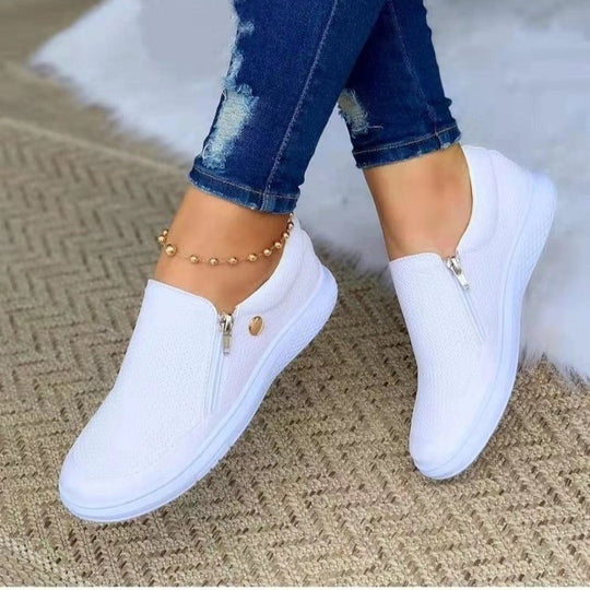 Damen Slip-On Sneakers mit seitlichem Reißverschluss und atmungsaktiver Textur EB