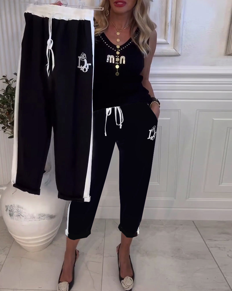 Damen nan Cropped-Jogginghose mit kontrastierendem Bund, seitlichem Zierstreifen, Kordelzug und Logostickerei EB