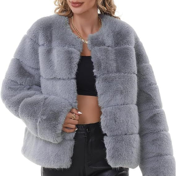 Damen modische Kunstfelljacke mit auffälligem Schnitt EB