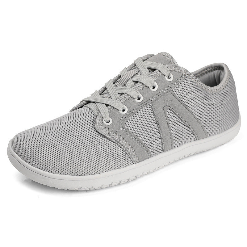 Unisex nan minimalistischer City-Sneaker mit feinmaschigem Textiloberteil, gepolstertem Einstieg und flexibler Gummilaufsohle EB