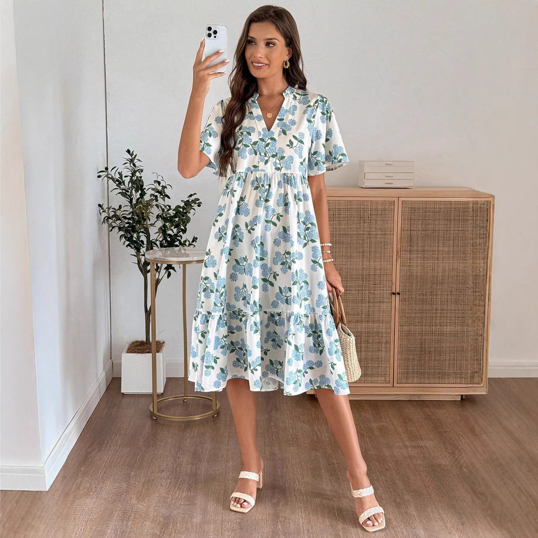 Damen Midikleid mit frischem Blumenmuster und voluminösem Rock EB