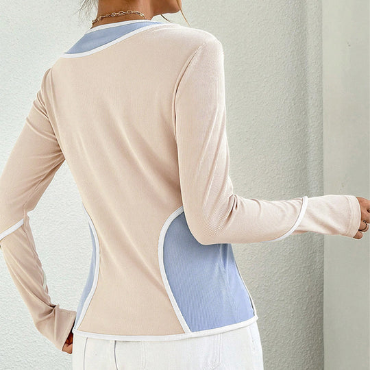 Damen figurbetontes Colorblock-Longsleeve mit Rundhalsausschnitt geschwungener Seitenpaneel‑Optik und feiner Rippstruktur Eichborn Berlin
