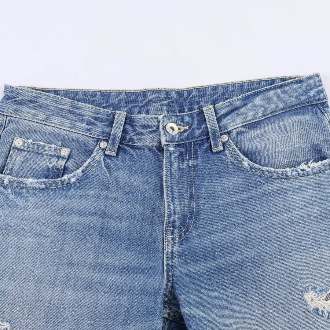 Damen Flared Jeans mit Destroyed-Effekten und Fransenabschlüssen EB