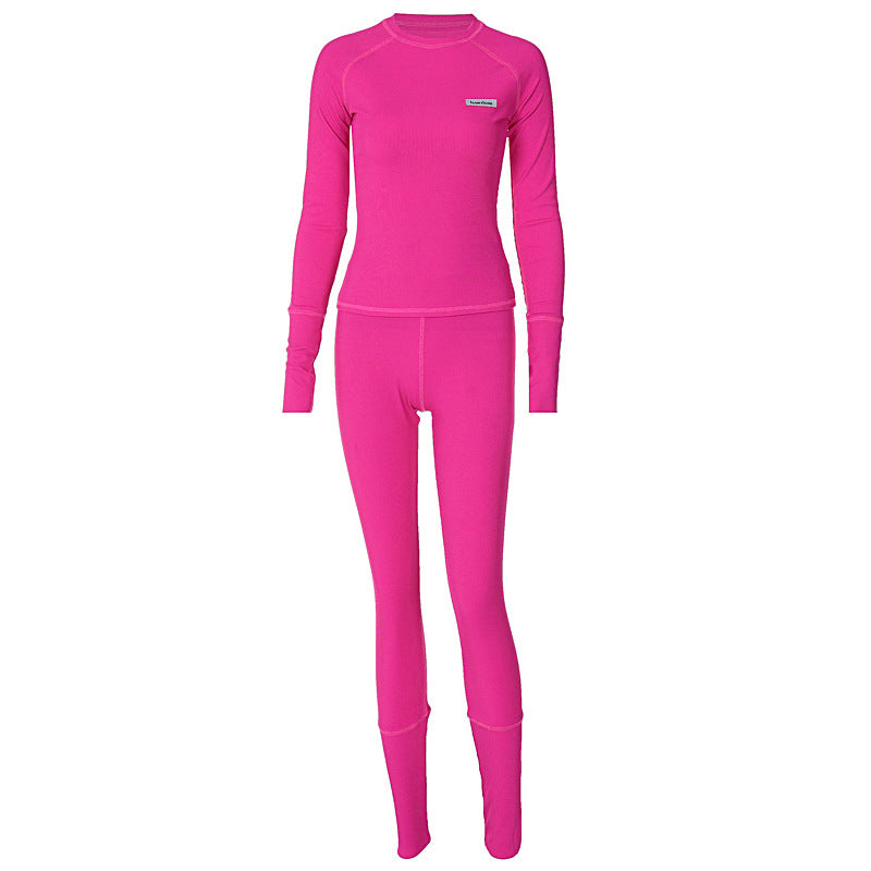 Damen Sportliches Funktions-Set mit langärmligem Oberteil und enganliegender Hose EB