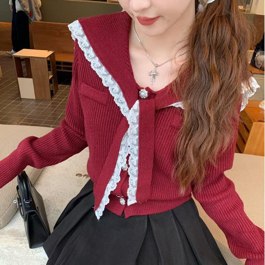Damen Strickjacke mit Rüschen-Halsband und dekorativen Knöpfen EB