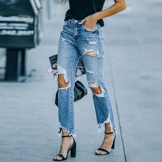 Damen high-waisted Jeans mit fransigen Details und modischen Rissen EB
