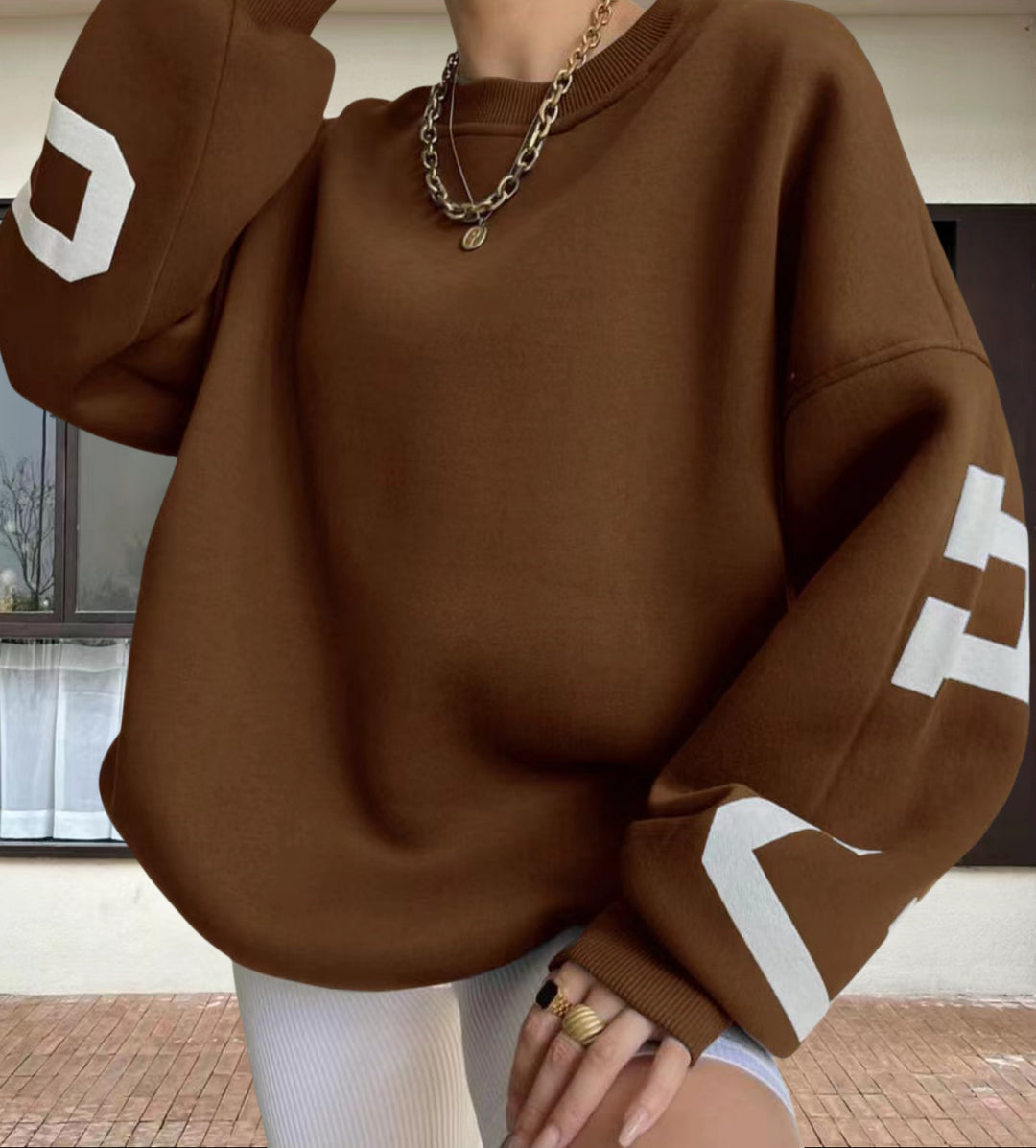 Damen Oversized Sweatshirt mit grafischen Akzenten EB